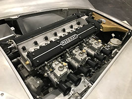 Maserati engine exposed in bay